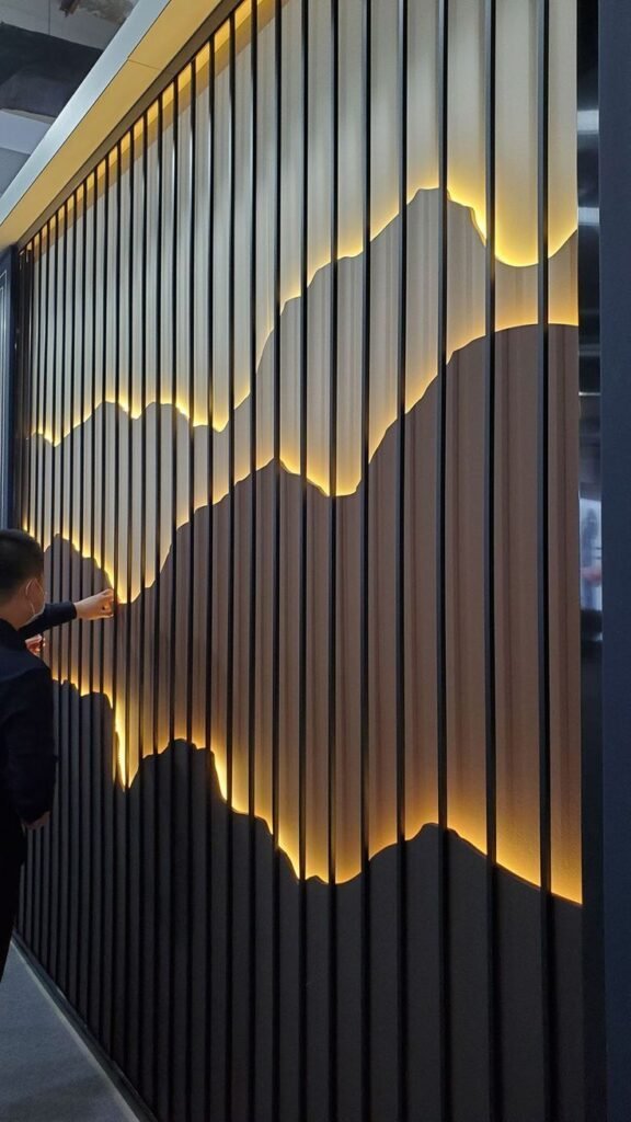 Modern interior spaces decorated with stylish wall panels featuring vertical lines and LED lighting.
