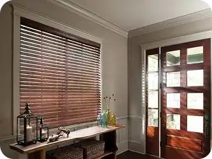 Modern wooden window blinds adding sophistication to a Dubai home interior.