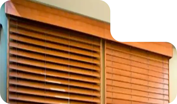 Dark wood blinds bringing a luxurious touch to a Dubai living room.