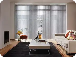 Vertical blinds in a Dubai living room offering adjustable light and privacy.