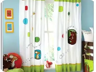 White kids’ curtain with playful cartoon animals and colorful shapes