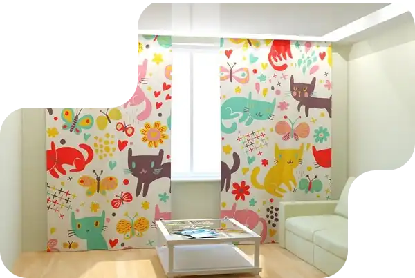 Colorful kids’ curtains with cartoon cats, butterflies, hearts, and flowers in a bright room