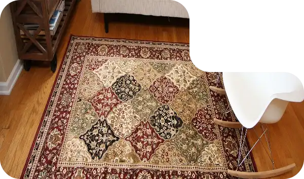 Traditional Persian rug with multicolor diamond floral patterns in red, green, beige, and black shades.