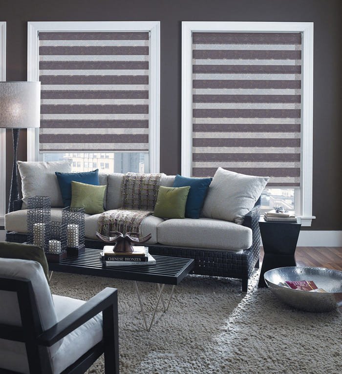 Grey zebra blinds in a modern grey-toned living room