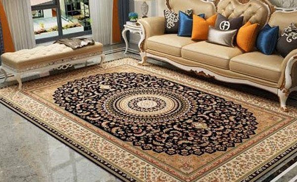 Handwoven Persian rug in rich brown shades featuring a detailed central medallion.