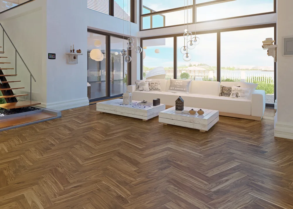 Close-up of premium herringbone wooden flooring with rich brown finish for Dubai interiors.