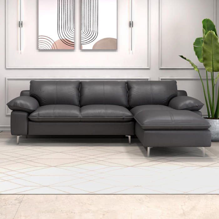 Modern L-shaped sofa in grey fabric for spacious living rooms.