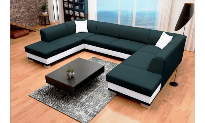 Green and black U Shape sofa in a contemporary lounge setup