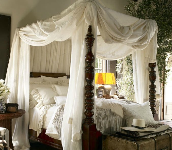 Elegant metal canopy bed frame with modern stylish finish.