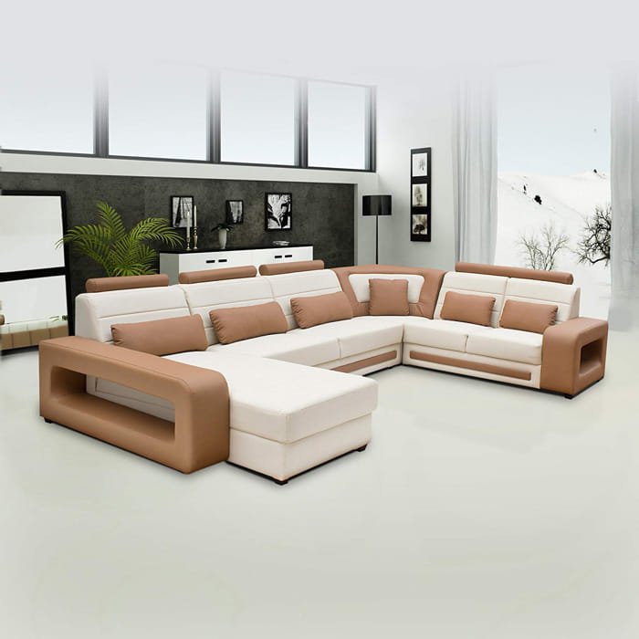 Beige U Shape sofa in a bright modern living room with white flooring