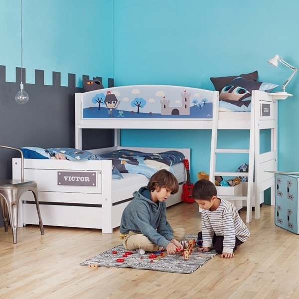 Single kids bed with safety rails for toddlers.