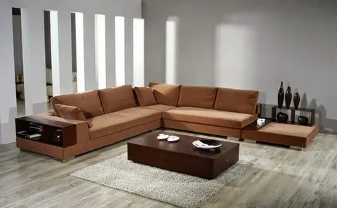 Luxury leather L-shaped sectional sofa with adjustable headrests.