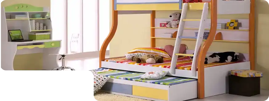 White kids bed with trundle for extra sleeping space.