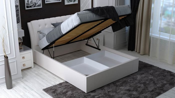 Upholstered king size storage bed with tufted headboard and hidden compartments.