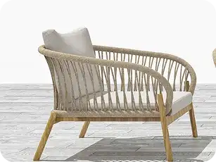 Contemporary black woven outdoor chairs with soft grey seat cushions.