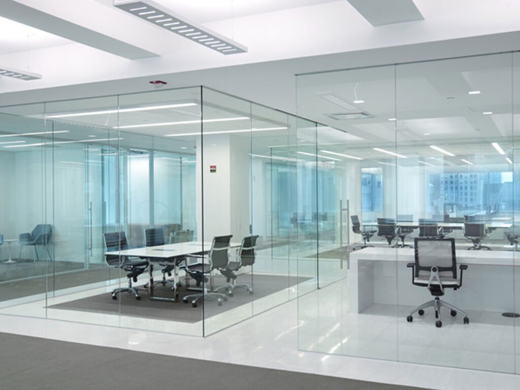Customized glass partition with aluminum frame by Fixit Home in Dubai.